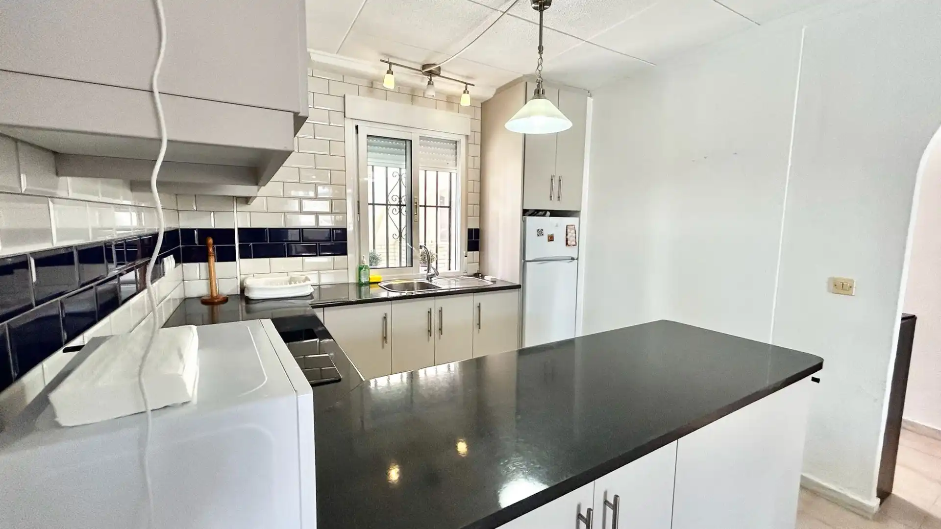 Cocina de Planta baja de alquiler en Pilar de la Horadada con Aire acondicionado, Terraza y Piscina