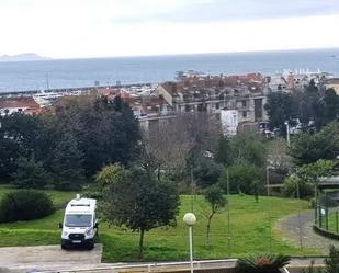 Vista exterior de Pis en venda en Sanxenxo amb Jardí privat, Terrassa i Traster