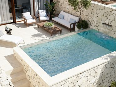 Adosado de obra nueva con jardín en venta en Los Boliches