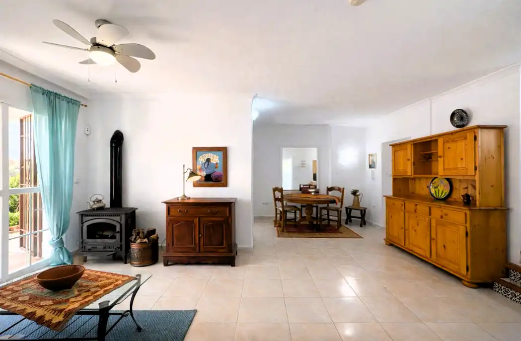 Sala d'estar de Casa adosada en venda en Mijas amb Jardí privat, Terrassa i Traster