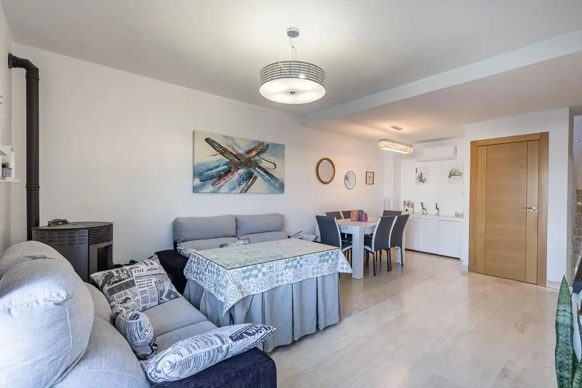 Sala de estar de Casa adosada en venta en Las Gabias con Piscina comunitaria