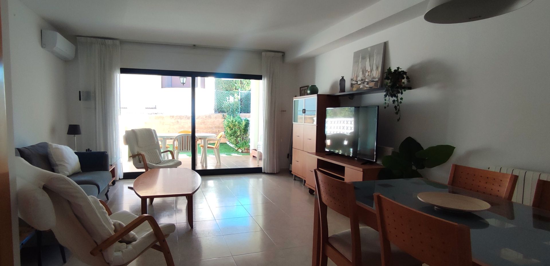 Sala d'estar de Casa adosada de lloguer en Llançà amb Aire condicionat, Calefacció i Jardí privat