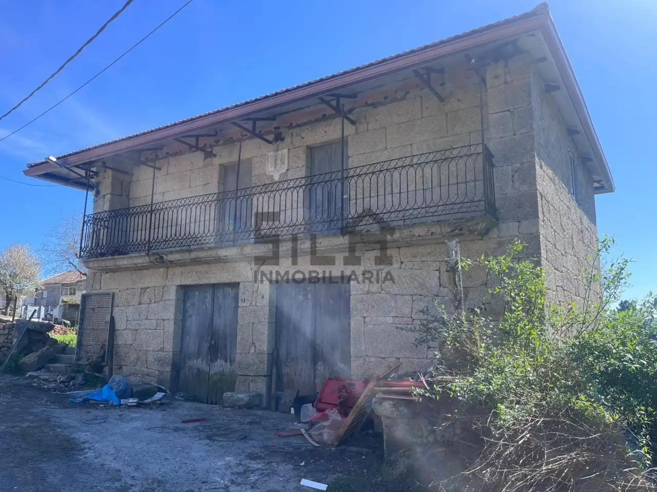 Vista exterior de Casa o xalet en venda en San Amaro amb Calefacció, Jardí privat i Traster