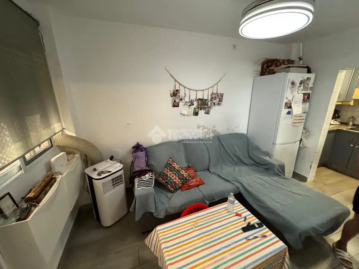 Sala d'estar de Casa adosada en venda en La Rinconada amb Aire condicionat i Calefacció