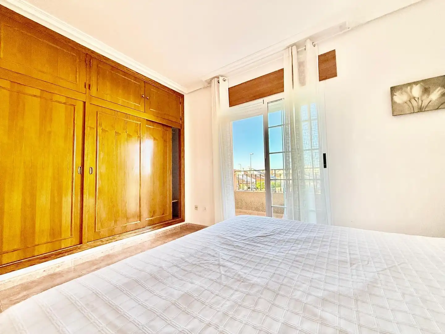 Habitación de Casa adosada en venta en Pilar de la Horadada con Aire acondicionado, Calefacción y Jardín privado