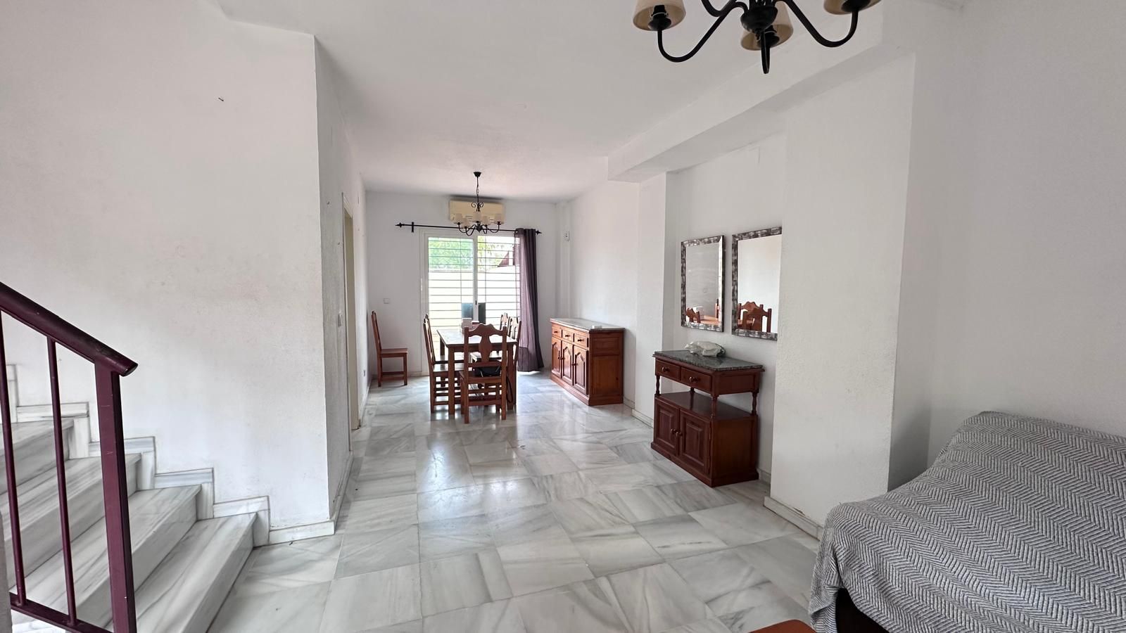 Dining room of Single-family semi-detached for sale in Coria del Río  with Air Conditioner, Terrace and Furnished