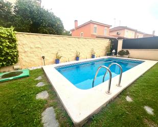 Swimming pool of Single-family semi-detached for sale in Bormujos  with Terrace, Storage room and Swimming Pool