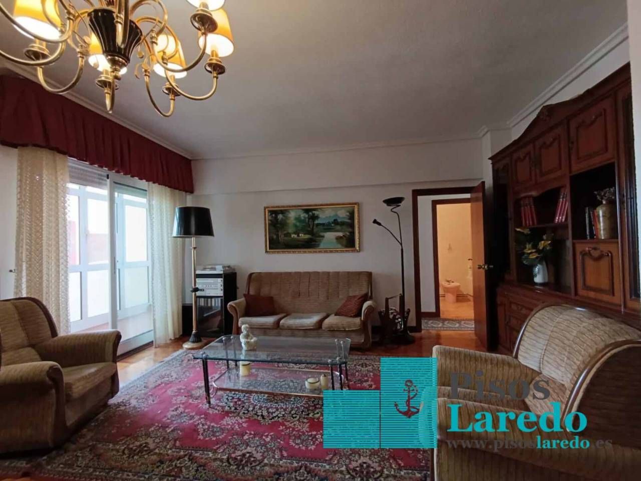 Sala de estar de Piso en venta en Laredo con Calefacción, Parquet y Terraza