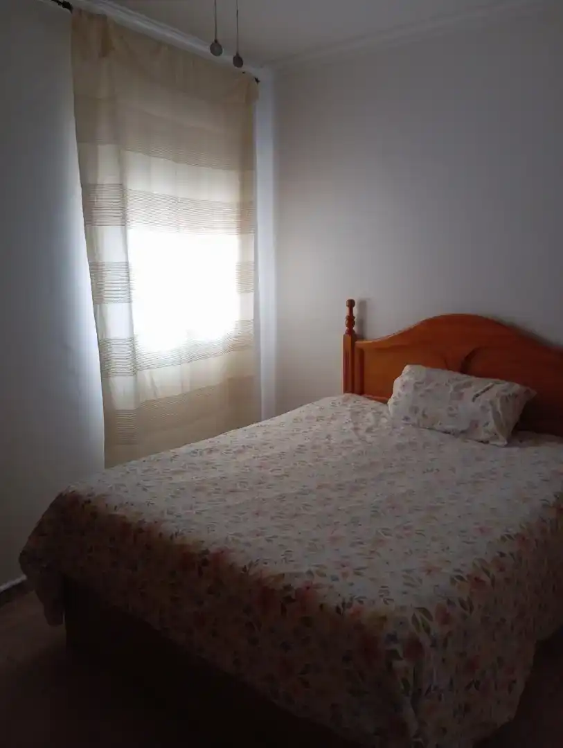 Dormitori de Casa adosada en venda en Dos Hermanas amb Aire condicionat i Balcó