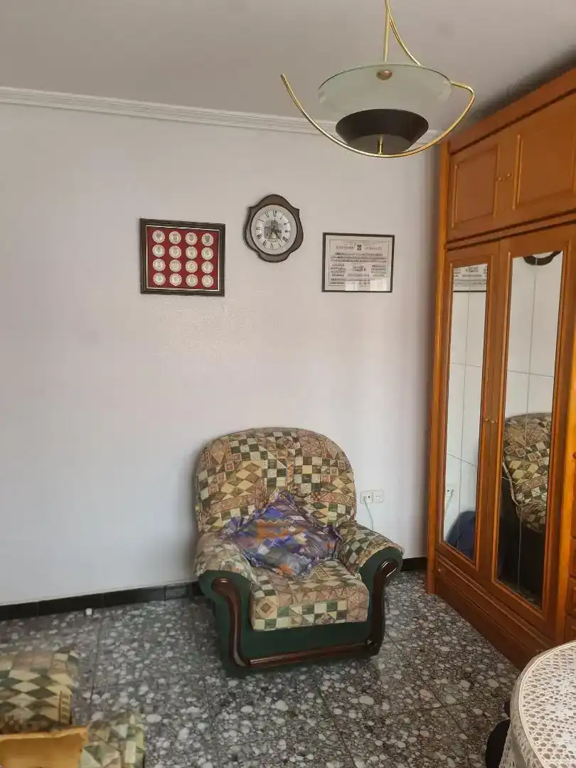 Sala d'estar de Casa adosada en venda en Sahagún