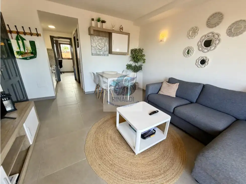 Sala de estar de Apartamento en venta en La Oliva con Terraza, Piscina y Amueblado