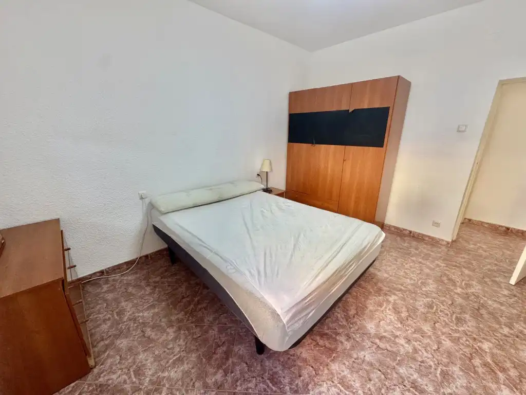 Bedroom of Flat for share in Córdoba