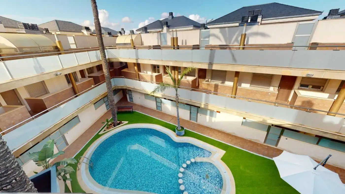 Piscina de Casa adosada en venda en Pilar de la Horadada amb Aire condicionat, Jardí privat i Terrassa