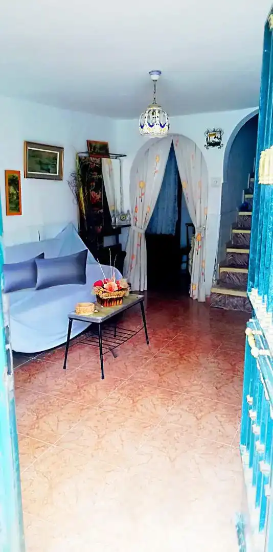 Sala de estar de Casa adosada en venta en Uclés con Amueblado