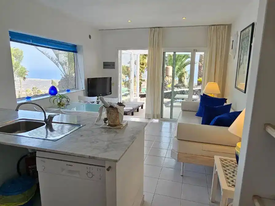 Sala de estar de Piso en venta en Tías con Jardín privado, Parquet y Piscina