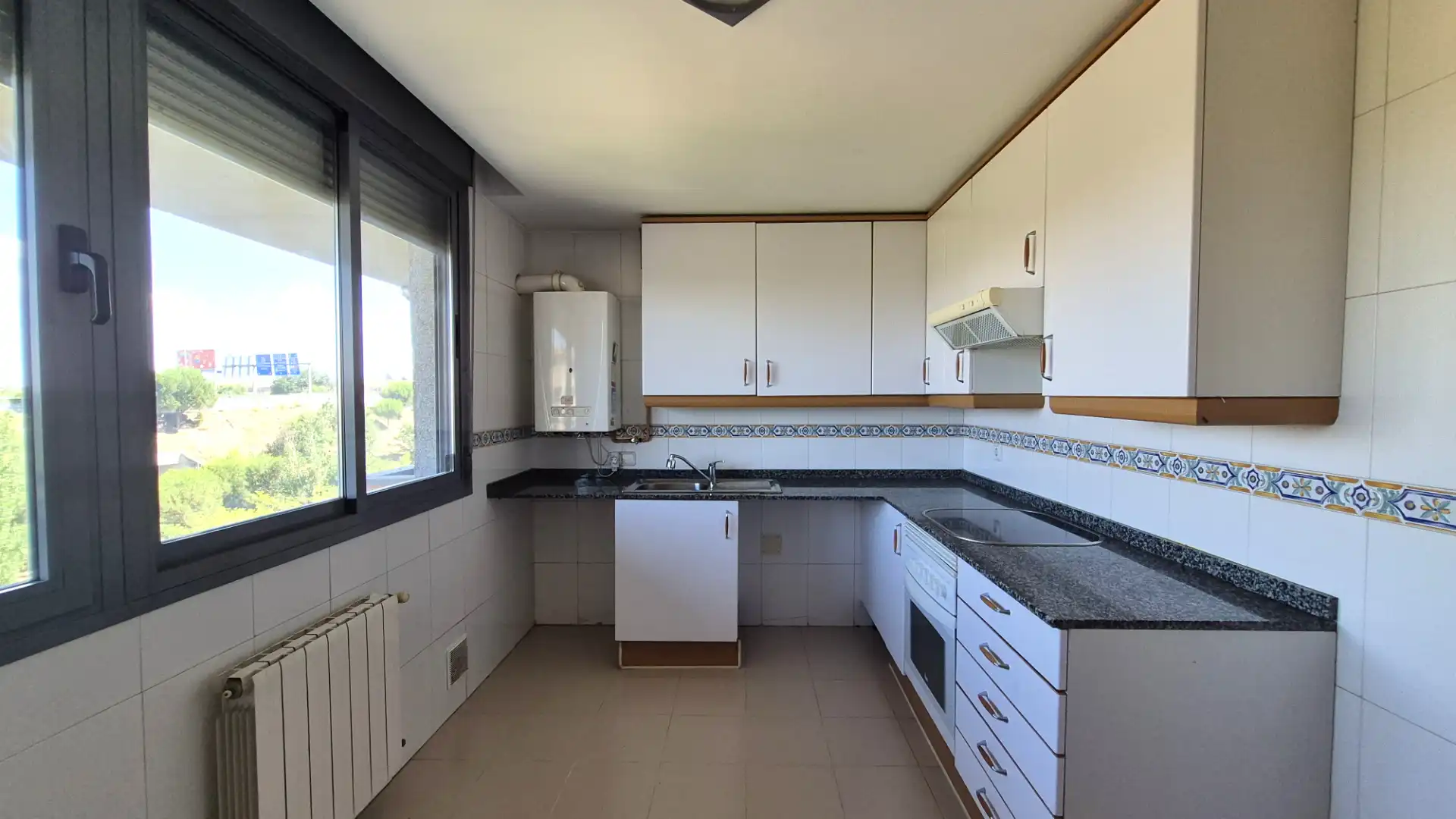 Kitchen of Attic for rent in Madrid  with Terrace and Community pool