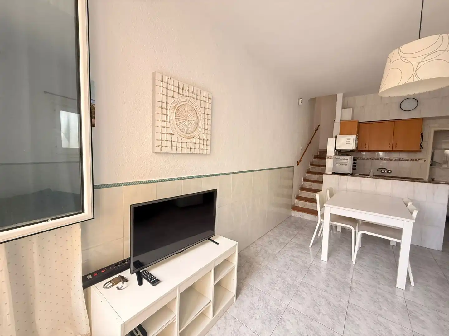 Sala d'estar de Casa adosada en venda en Empuriabrava amb Aire condicionat, Calefacció i Moblat
