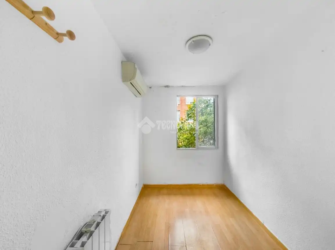 Habitación de Casa adosada en venta en Ciudad Lineal