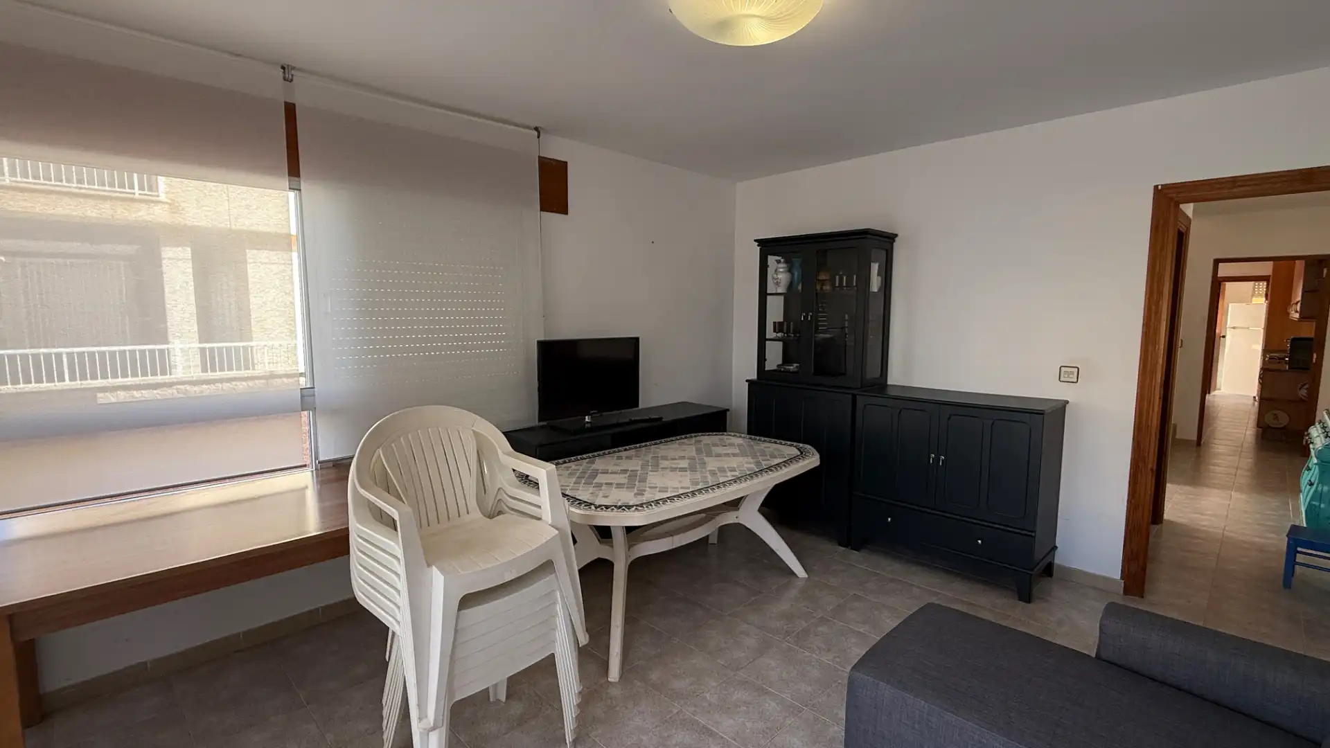 Sala de estar de Casa adosada en venta en Águilas con Jardín privado, Terraza y Trastero