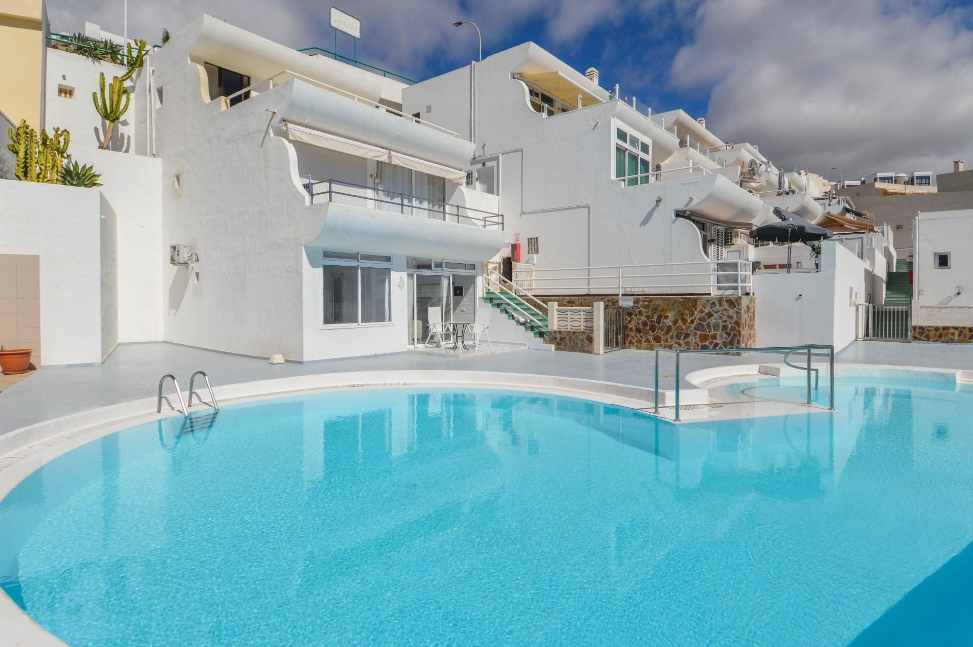 Exterior view of Apartment for sale in Mogán  with Air Conditioner, Terrace and Community pool