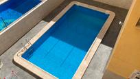 Swimming pool of Flat for sale in Torrevieja  with Air Conditioner, Heating and Terrace