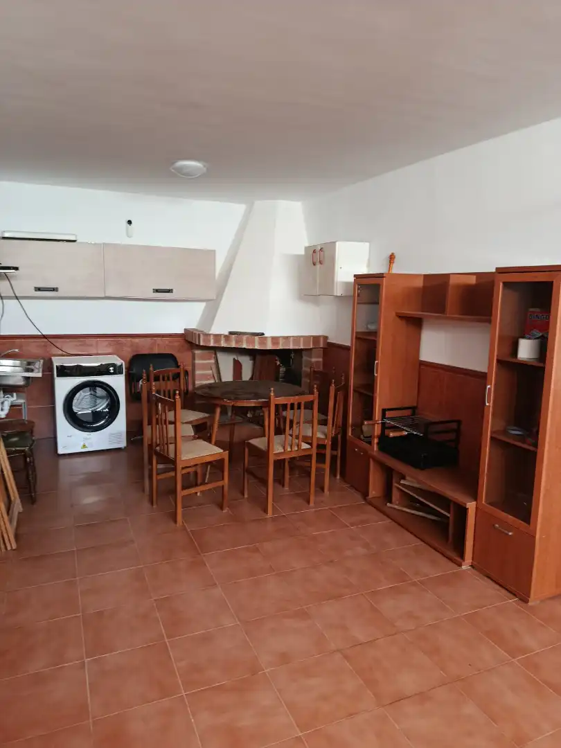 Sala d'estar de Casa adosada en venda en Mota del Cuervo amb Calefacció, Terrassa i Moblat