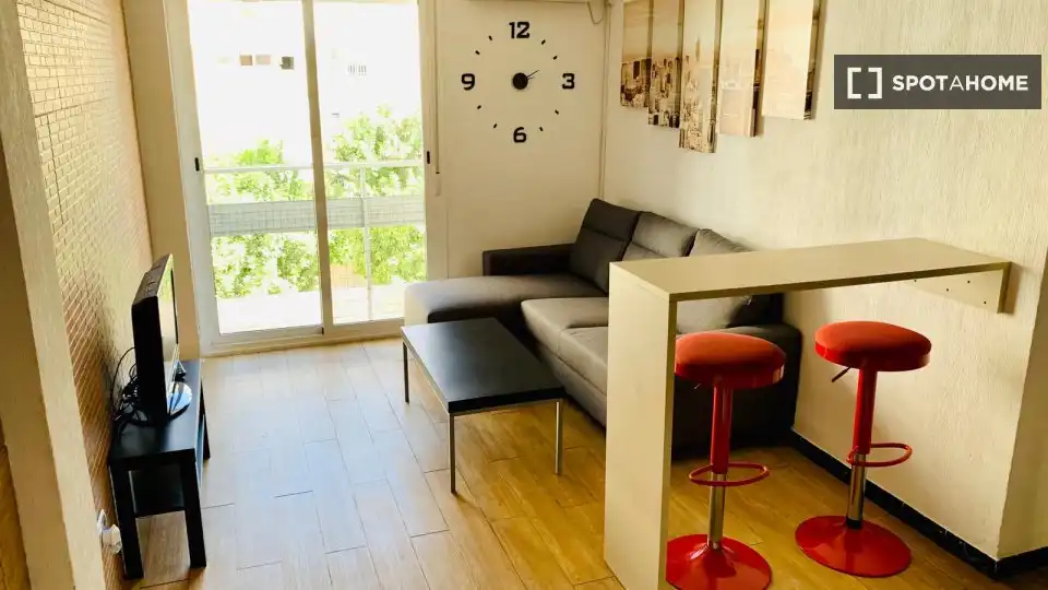 Sala d'estar de Pis per a compartir en Sevilla amb Aire condicionat, Terrassa i Moblat