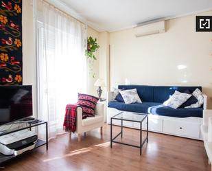Living room of Flat to rent in  Madrid Capital  with Air Conditioner, Heating and Furnished