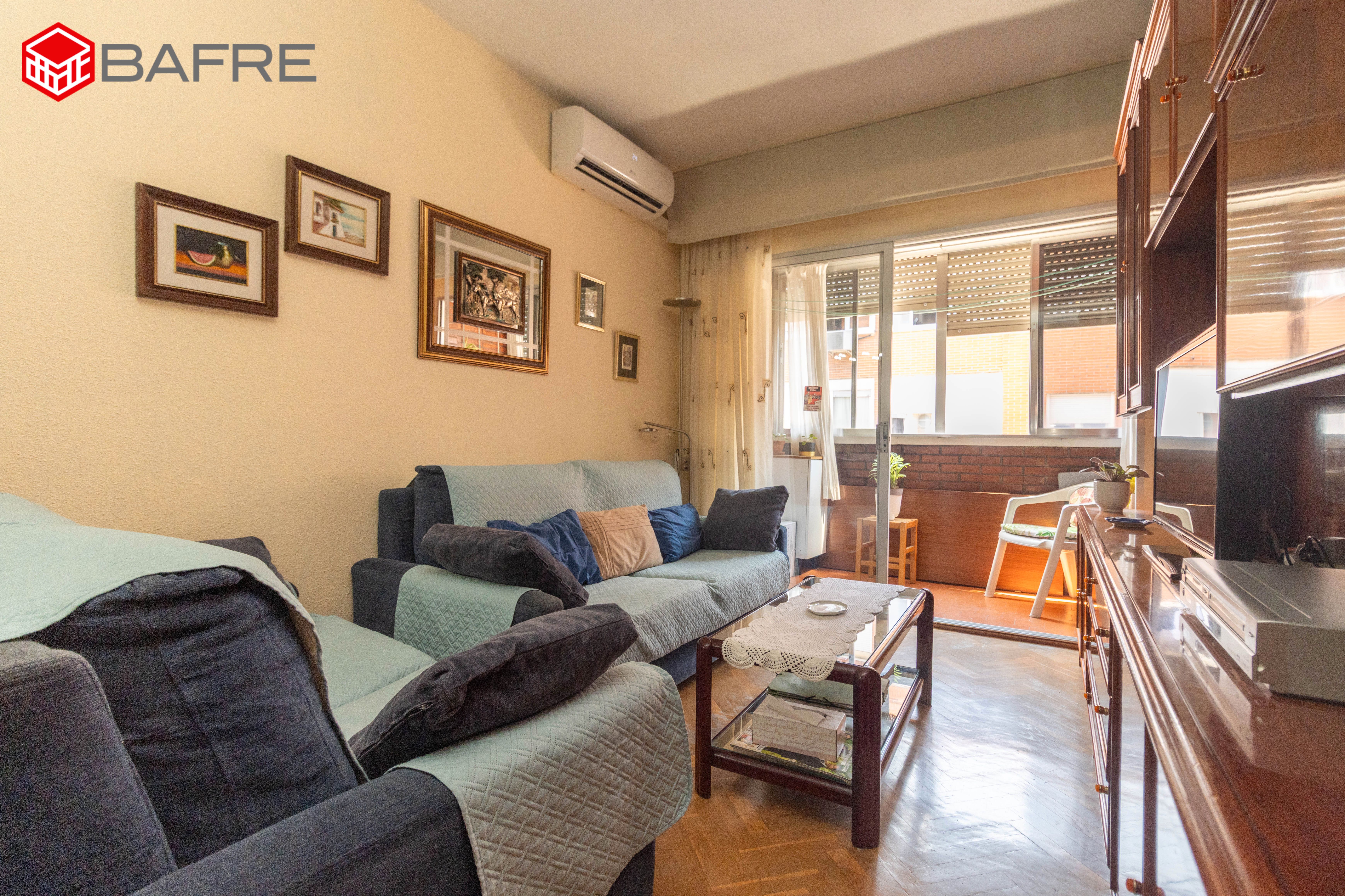 Living room of Flat for sale in Humanes de Madrid  with Air Conditioner, Heating and Parquet flooring