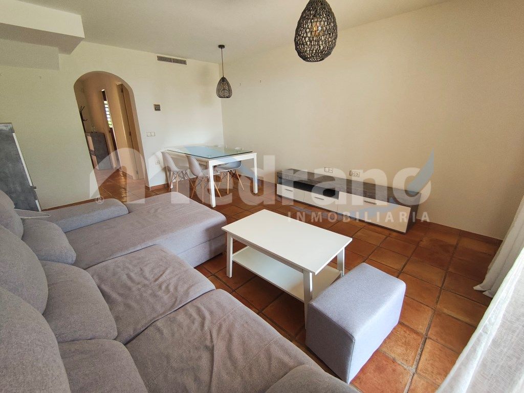Sala d'estar de Casa adosada de lloguer en Finestrat amb Aire condicionat, Calefacció i Jardí privat