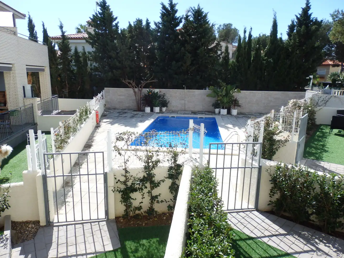 Schwimmbecken von Einfamilien-Reihenhaus zum Verkauf in Mont-roig del Camp mit Klimaanlage, Privatgarten und Terrasse