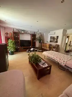 Sala d'estar de Casa adosada en venda en Valdemoro amb Aire condicionat i Piscina
