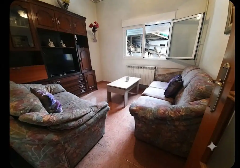 Sala d'estar de Casa o xalet en venda en Ponferrada amb Jardí privat, Traster i Moblat