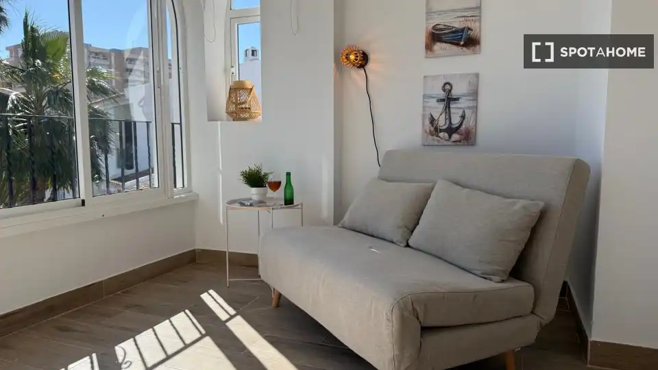 Sala d'estar de Apartament per a compartir en La Manga del Mar Menor amb Aire condicionat, Terrassa i Moblat
