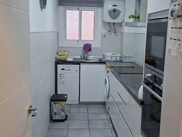 Kitchen of Flat for sale in Cunit  with Air Conditioner, Terrace and Balcony