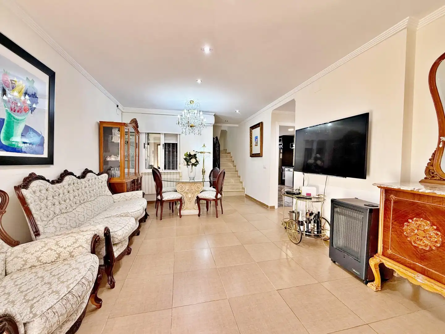 Sala d'estar de Casa adosada en venda en Torrent amb Aire condicionat, Calefacció i Jardí privat