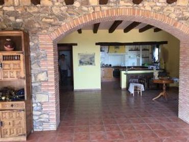 Casa rústica amb jardí en venda a Terrades