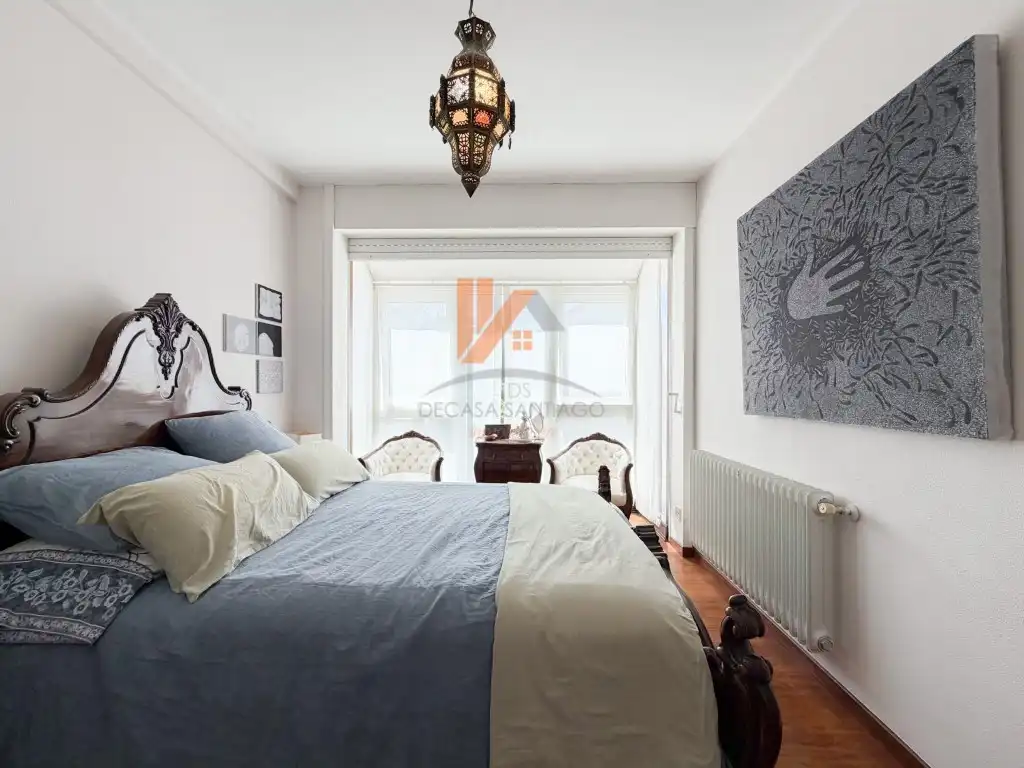 Habitación de Casa adosada en venta en Brión con Jardín privado, Trastero y Horno