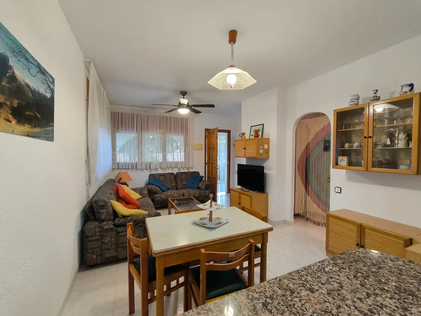 Sala d'estar de Casa adosada en venda en Alcanar amb Jardí privat i Terrassa