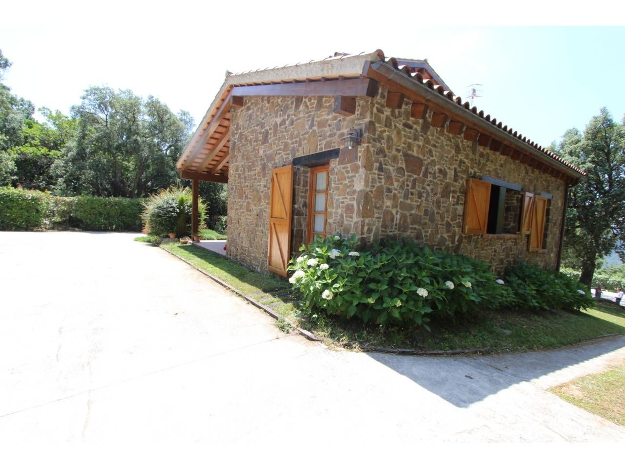 Exterior view of House or chalet for sale in Riells i Viabrea  with Air Conditioner, Heating and Private garden