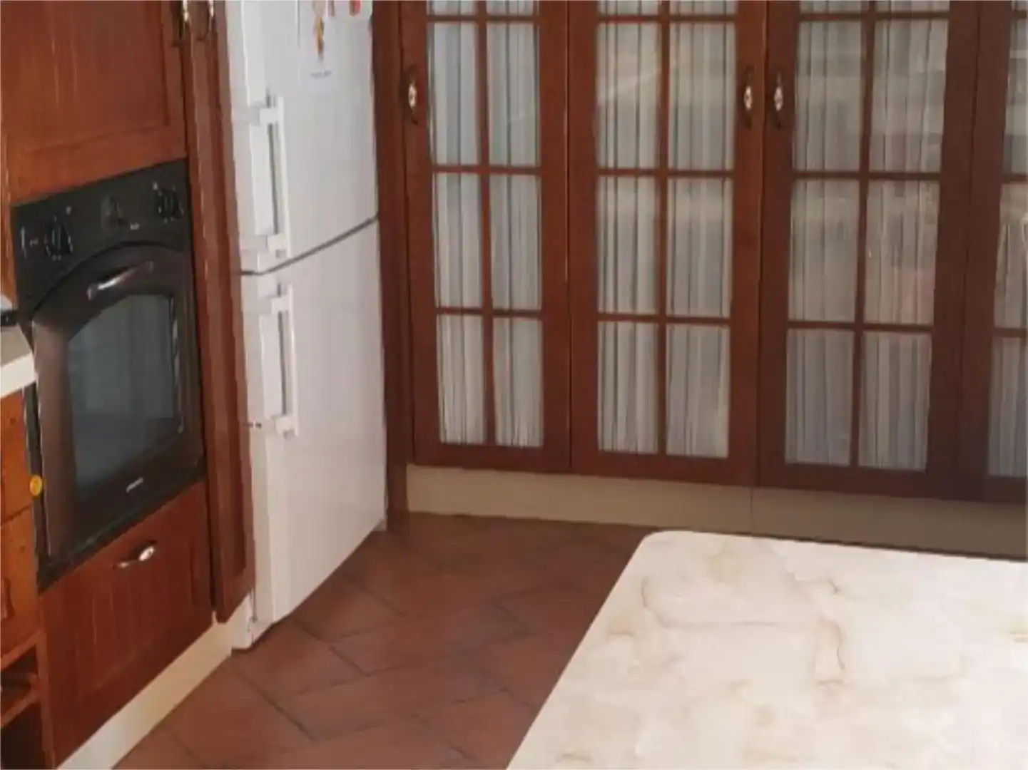 Cuina de Casa adosada en venda en Sevilla amb Aire condicionat, Piscina i Moblat