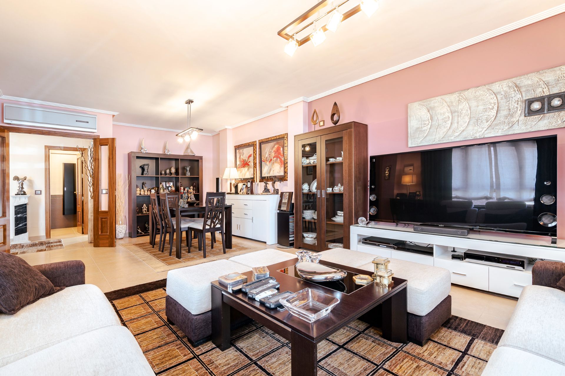 Sala de estar de Casa adosada en venta en Meco con Aire acondicionado, Jardín privado y Piscina