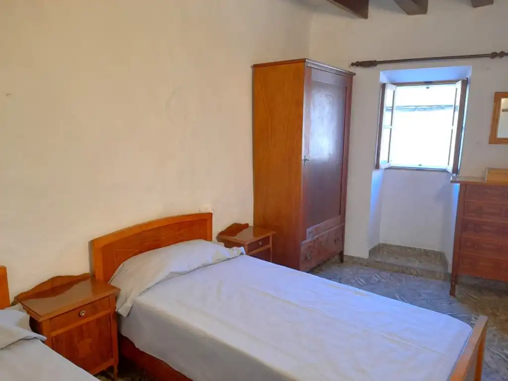 Schlafzimmer von Einfamilien-Reihenhaus zum Verkauf in Pollença