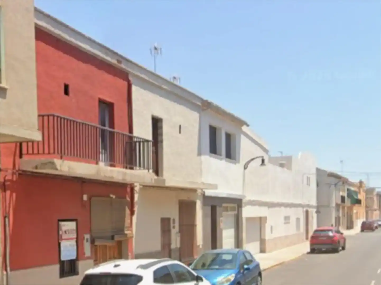 Vista exterior de Casa adosada en venda en Guadassuar amb Balcó