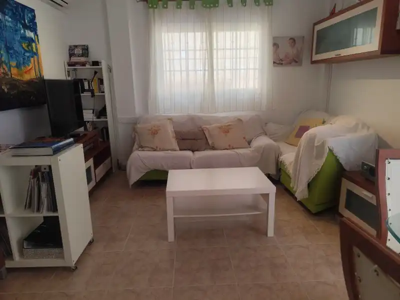 Sala de estar de Casa adosada en venta en Cullera con Aire acondicionado, Calefacción y Terraza