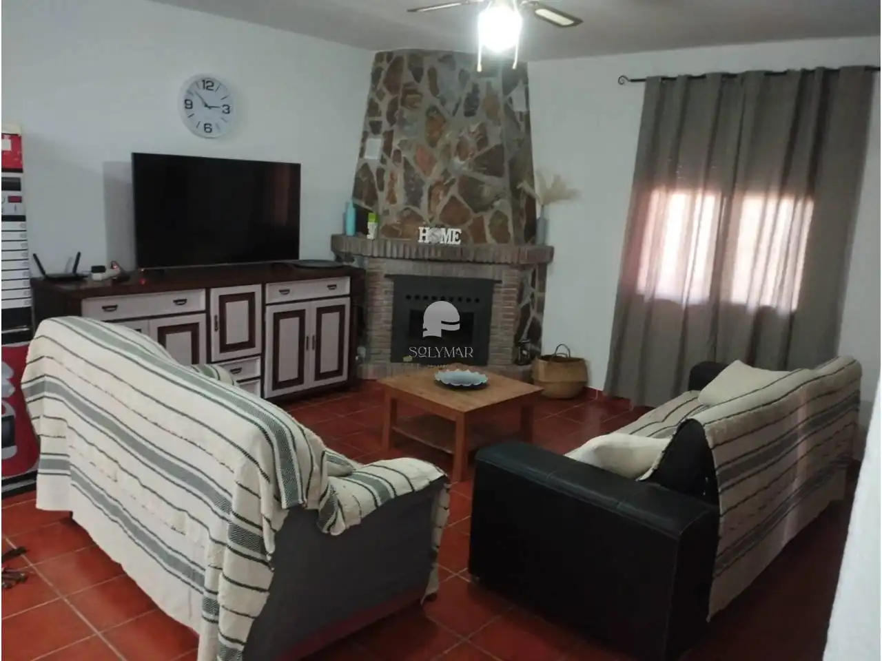 Sala de estar de Finca rústica de alquiler en Vélez-Málaga con Aire acondicionado, Jardín privado y Terraza
