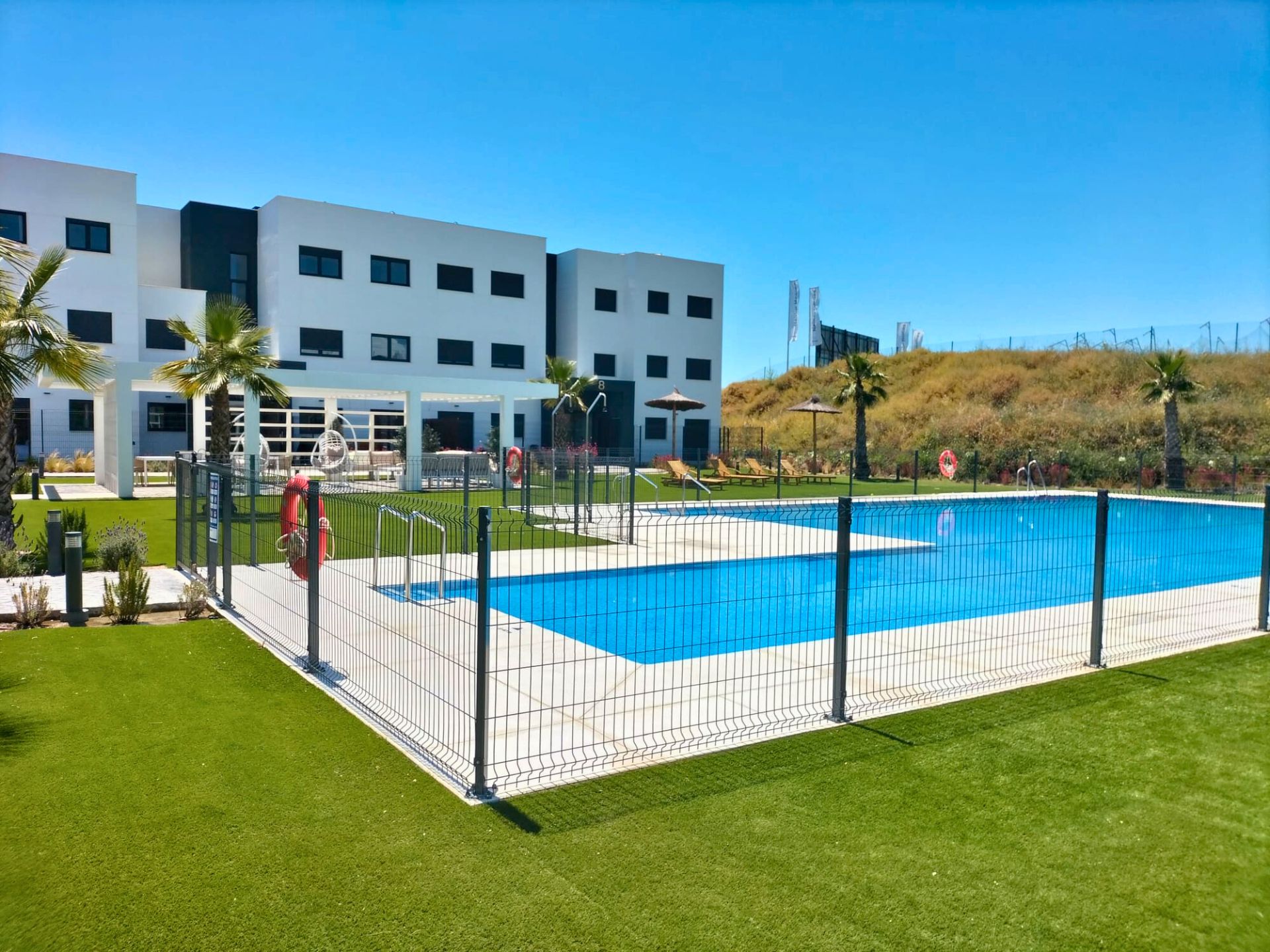 Swimming pool of Flat for sale in Estepona  with Air Conditioner, Private garden and Terrace
