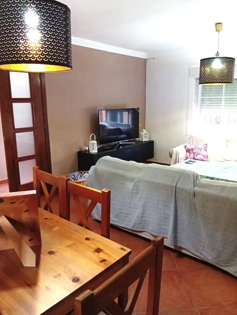 Sala de estar de Casa adosada en venta en Mijas con Aire acondicionado, Jardín privado y Terraza