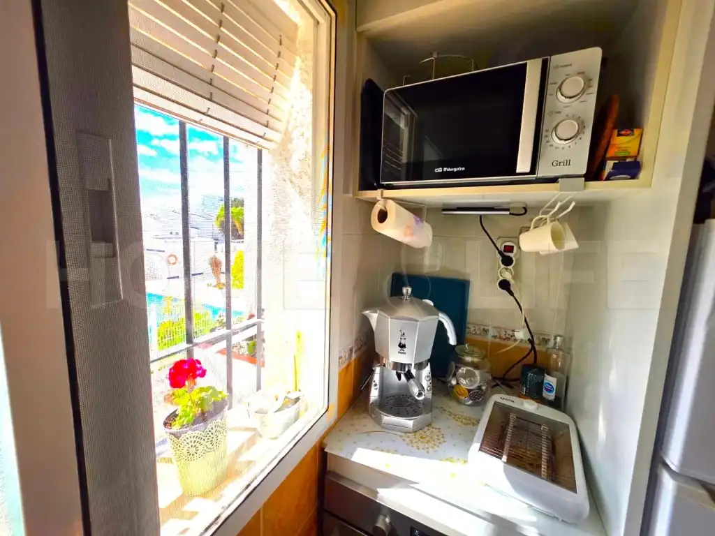 Cuina de Apartament en venda en Torremolinos amb Jardí privat, Piscina i Piscina comunitària
