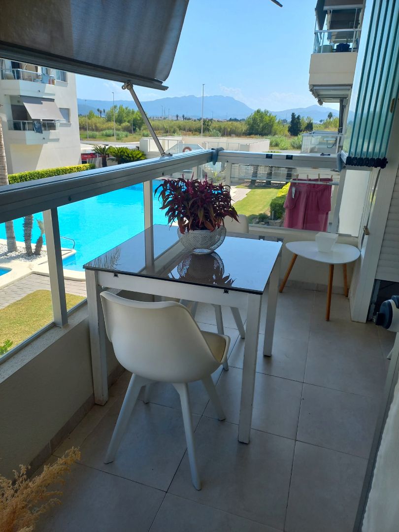 Terraza de Apartamento de alquiler en Daimús con Aire acondicionado, Jardín privado y Piscina